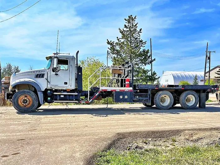 2007 Mack CTP713 Granite T/A Deck Truck image